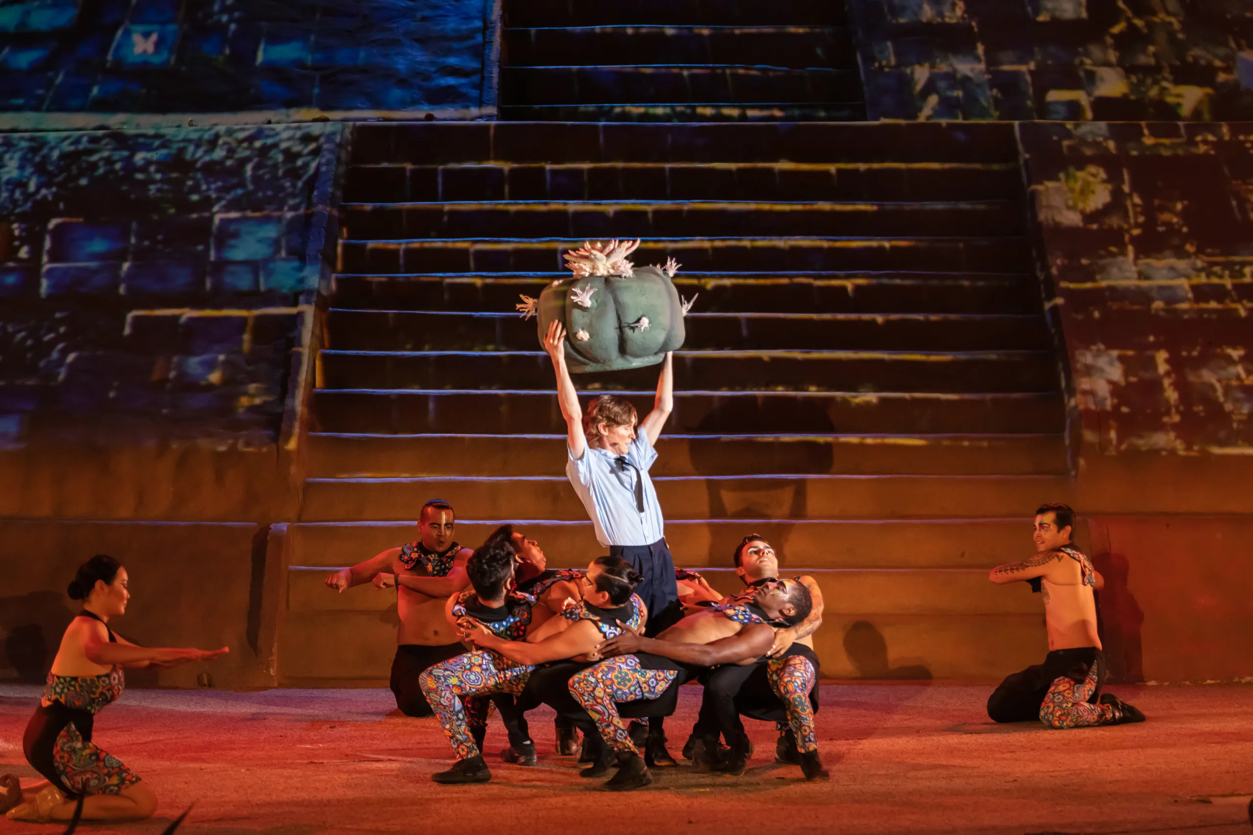 Stage and scenography lit by fire during ALMA at Las Caletas