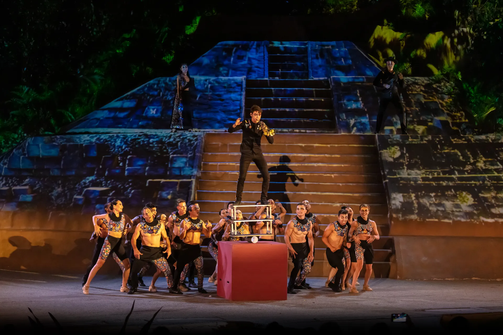 Performers mid-routine during the ALMA show at Las Caletas