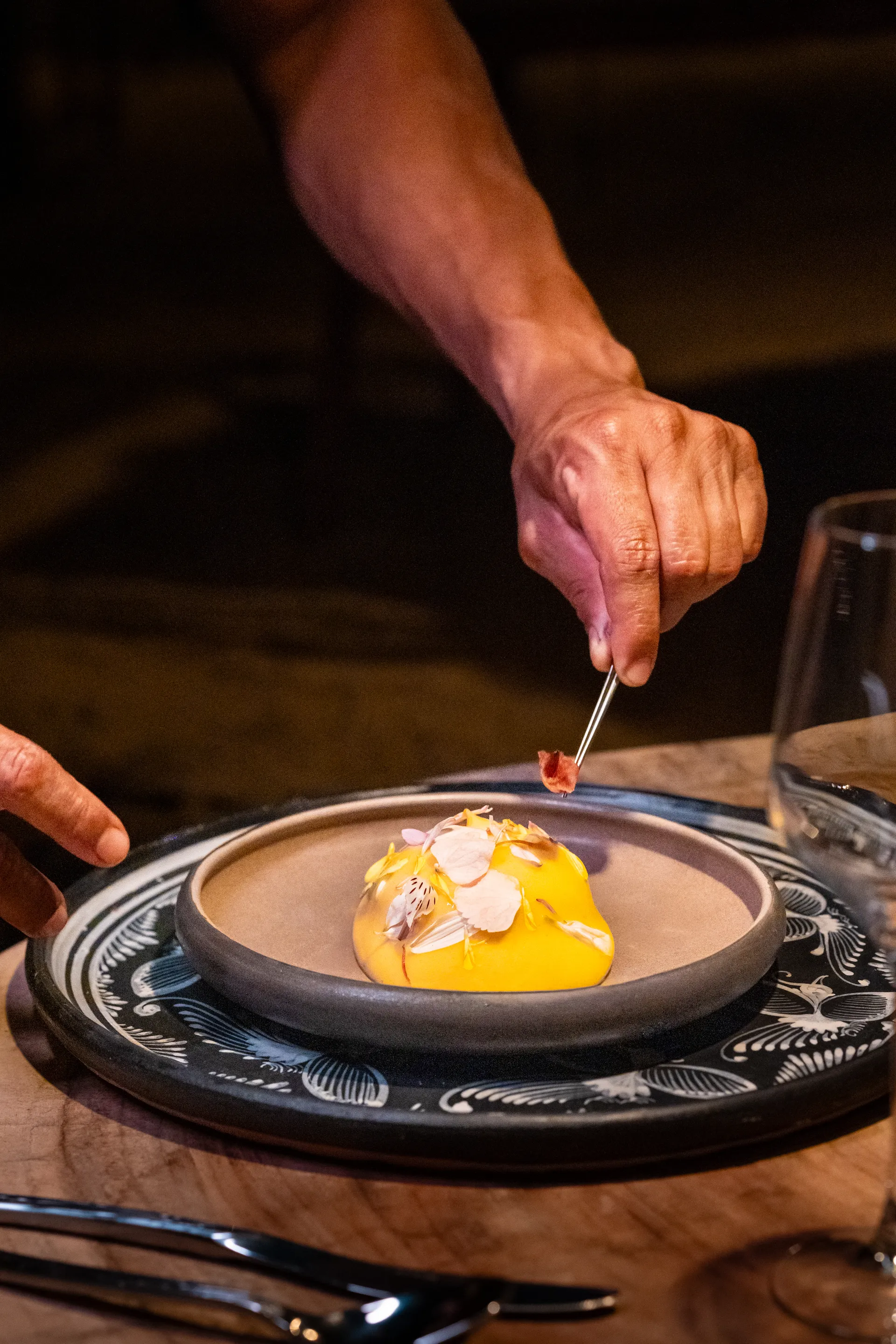 Plated course from the Premier fine-dining menu at Las Caletas